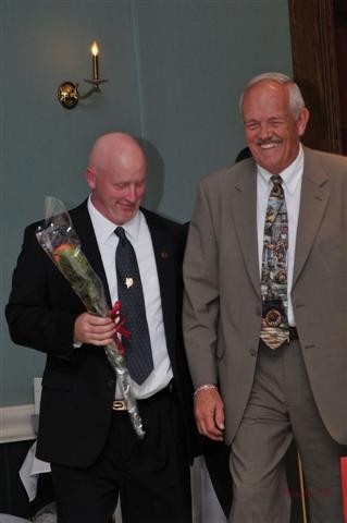 Firefighter Tim Kelly, Sr. and Assistant Chief Gerry Davis.